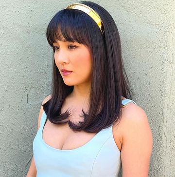 olivia rodrigo on the left with two long braided pigtails and constance wu on the right with brown straight hair and a gold headband olivia rodrigo on the left with two long braided pigtails and constance wu on the right with brown straight hair and a gold headband