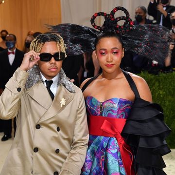 US-ENTERTAINMENT-FASHION-METGALA-CELEBRITY-MUSEUM-PEOPLE japanese tennis player naomi osaka r and us singer cordae arrive for the 2021 met gala at the metropolitan museum of art on september 13, 2021 in new york this years met gala has a distinctively youthful imprint, hosted by singer billie eilish, actor timothee chalamet, poet amanda gorman and tennis star naomi osaka, none of them older than 25 the 2021 theme is in america a lexicon of fashion photo by angela weiss afp photo by angela weissafp via getty images