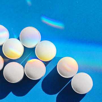 pills on blue background pills on blue background